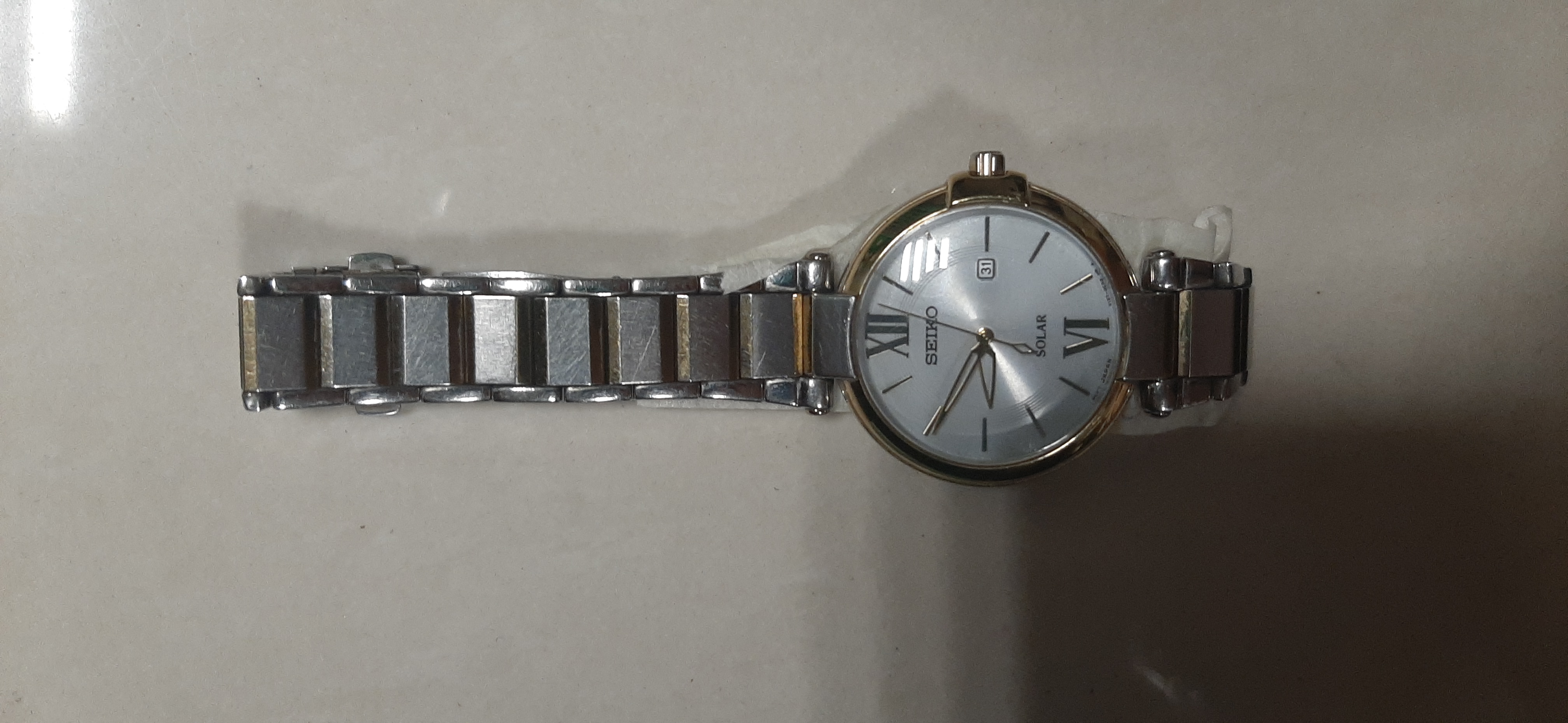 01 đồng hồ kim loại màu bạc hiệu SEIKO, khách quên ngày 29/07/022 - Cảng  hàng không Phú Quốc